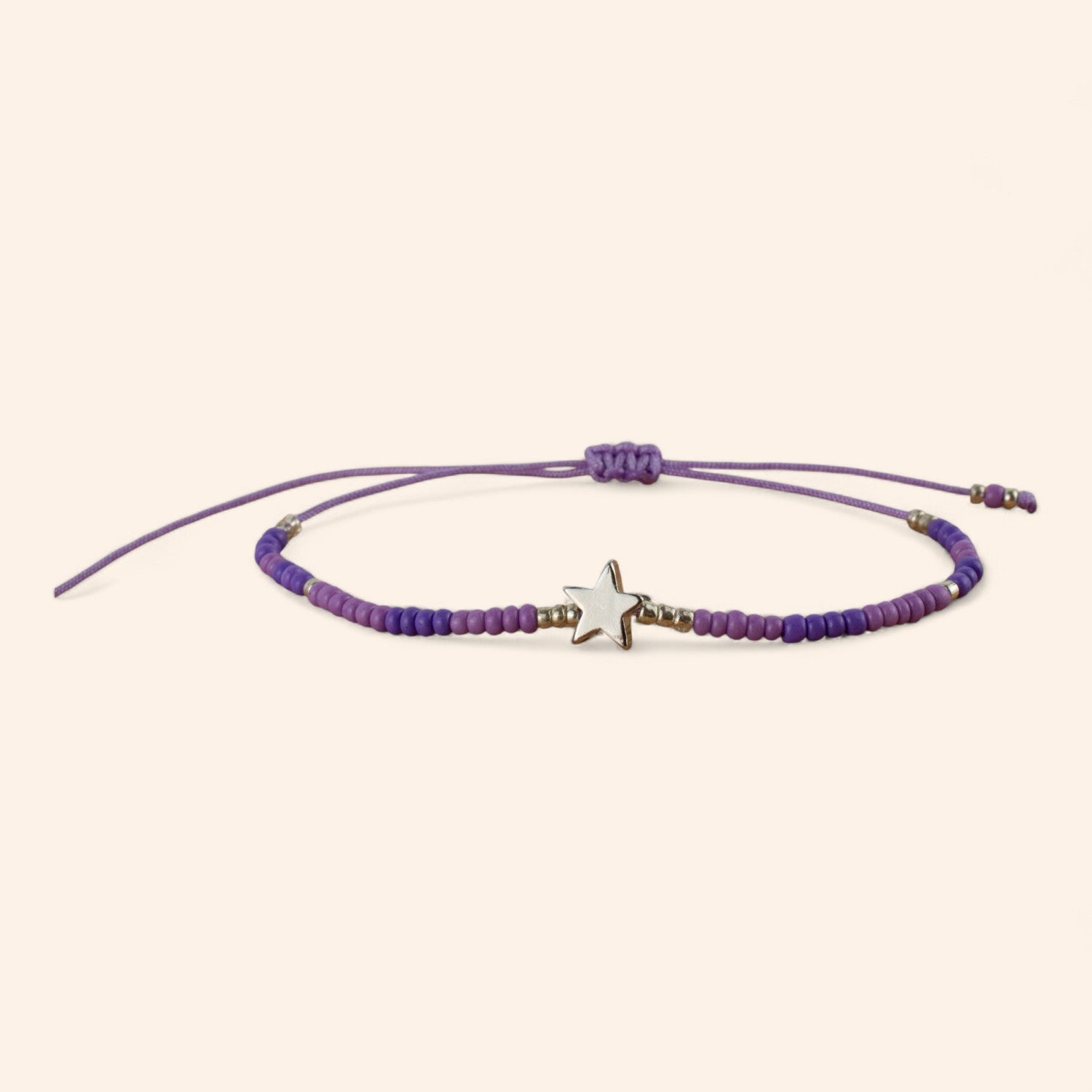 Bracelet perles rocailles violettes et perle étoile en métal argenté  Bracelet Jethyka