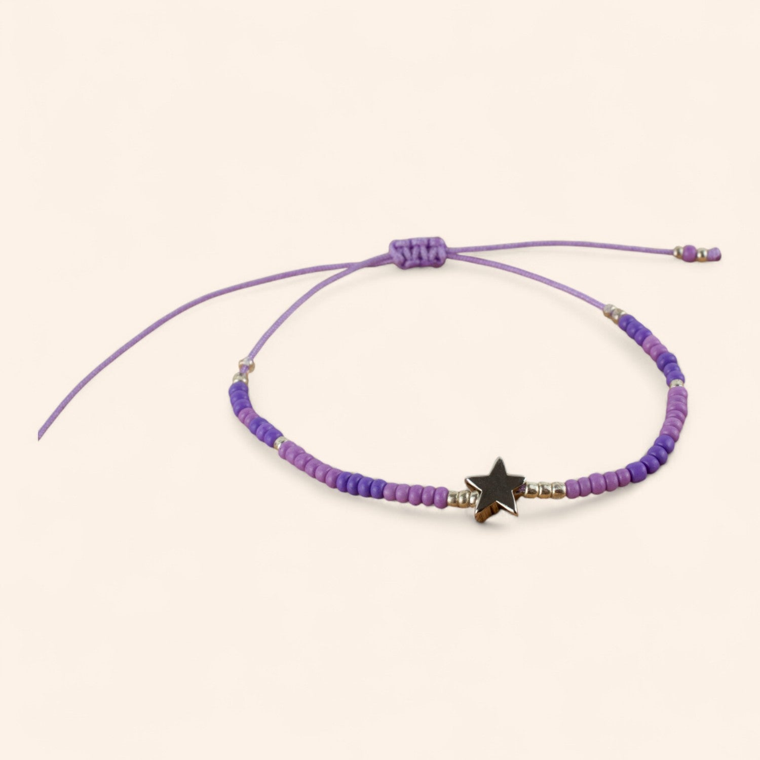 Bracelet perles rocailles violettes et perle étoile en métal argenté  Bracelet Jethyka