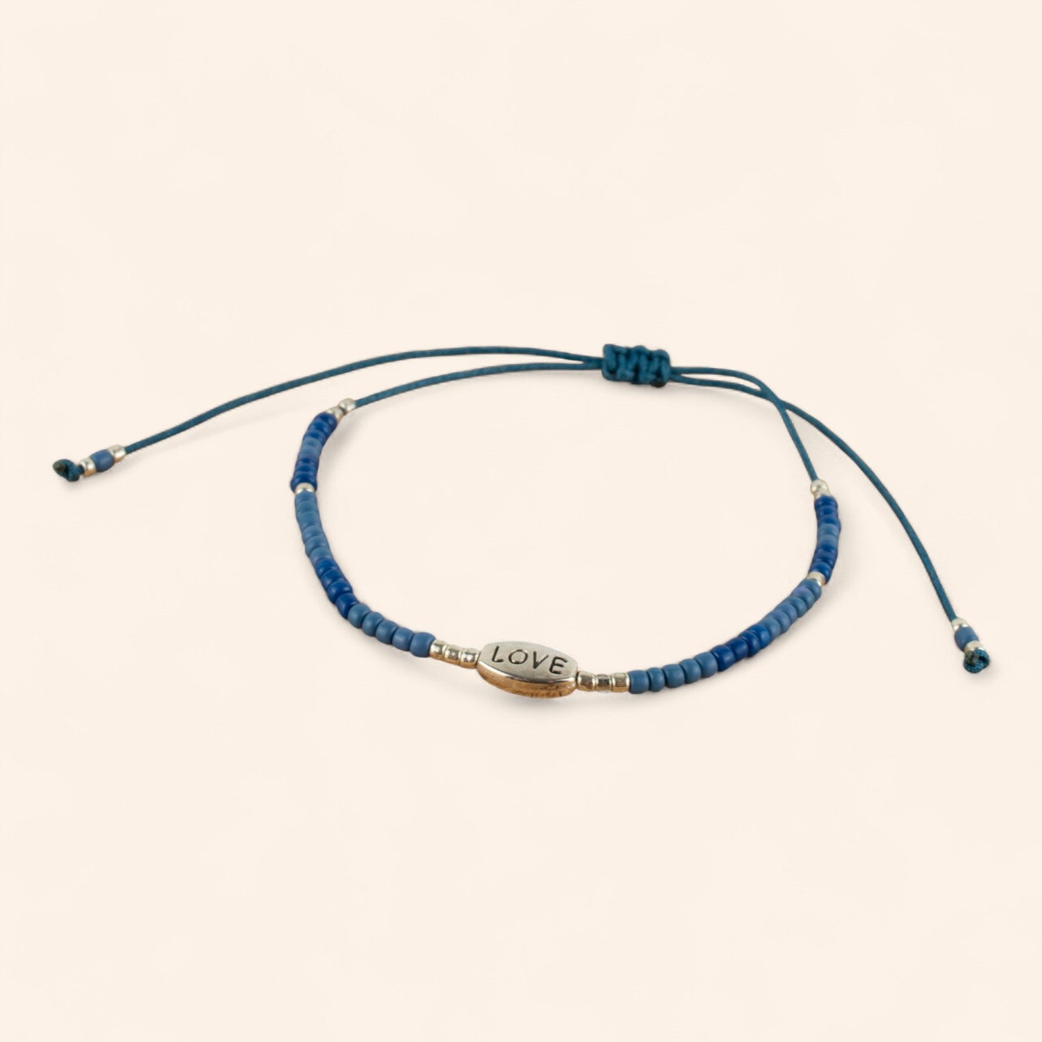 Bracelet en Perles Rocailles Bleues et Perle Love  Bracelet Jethyka