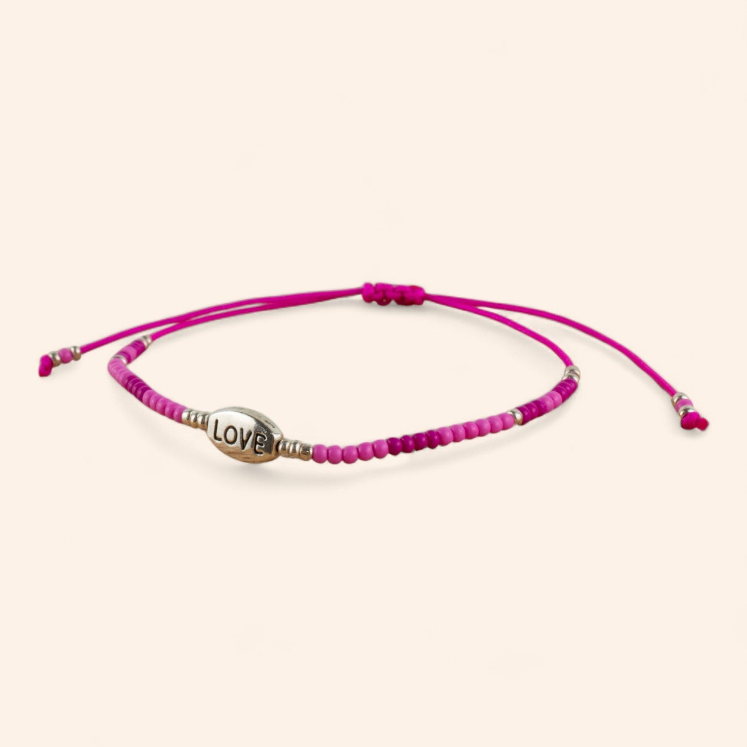 Bracelet perles rocailles fuchsia et perle Love en métal argenté  Bracelet Jethyka