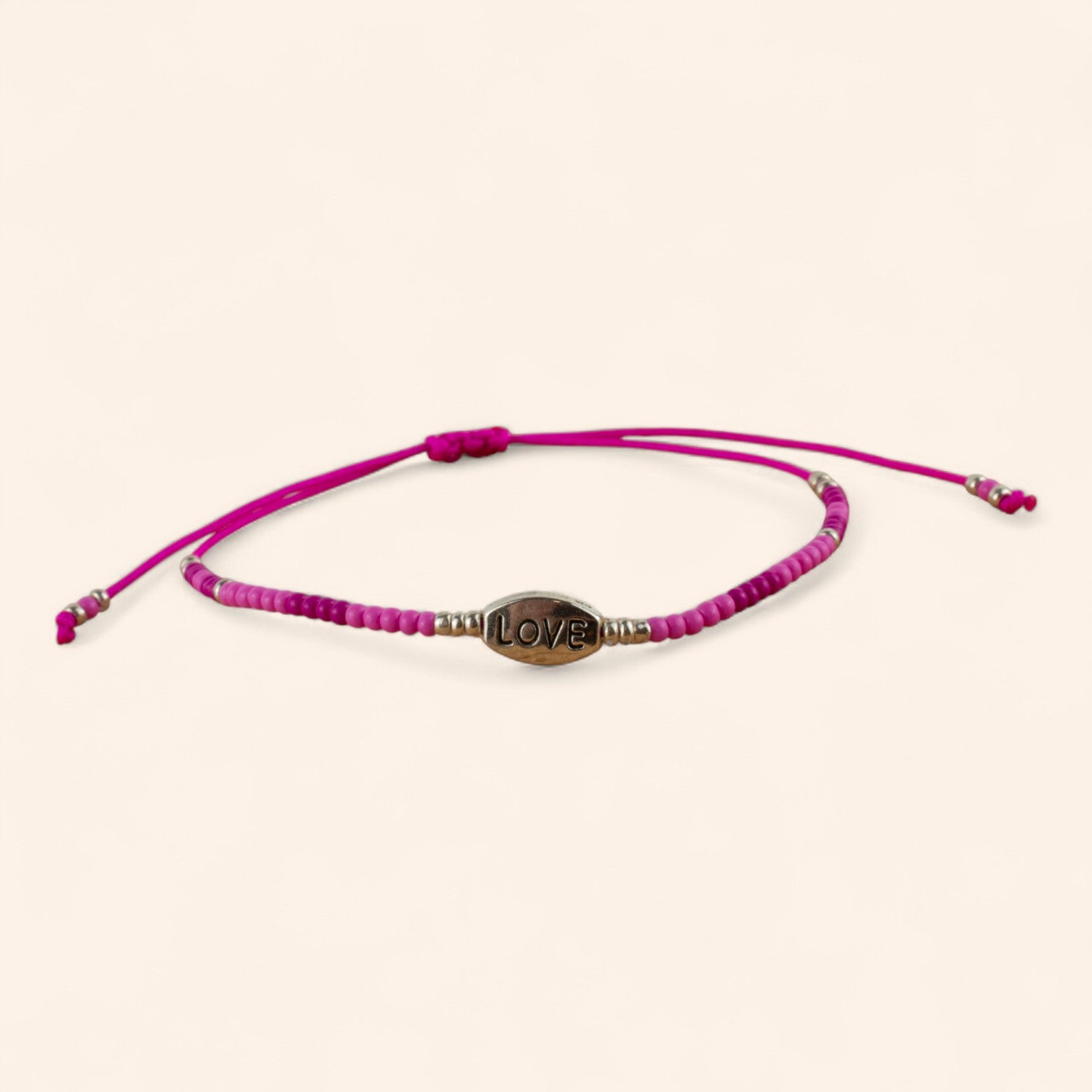 Bracelet perles rocailles fuchsia et perle Love en métal argenté  Bracelet Jethyka