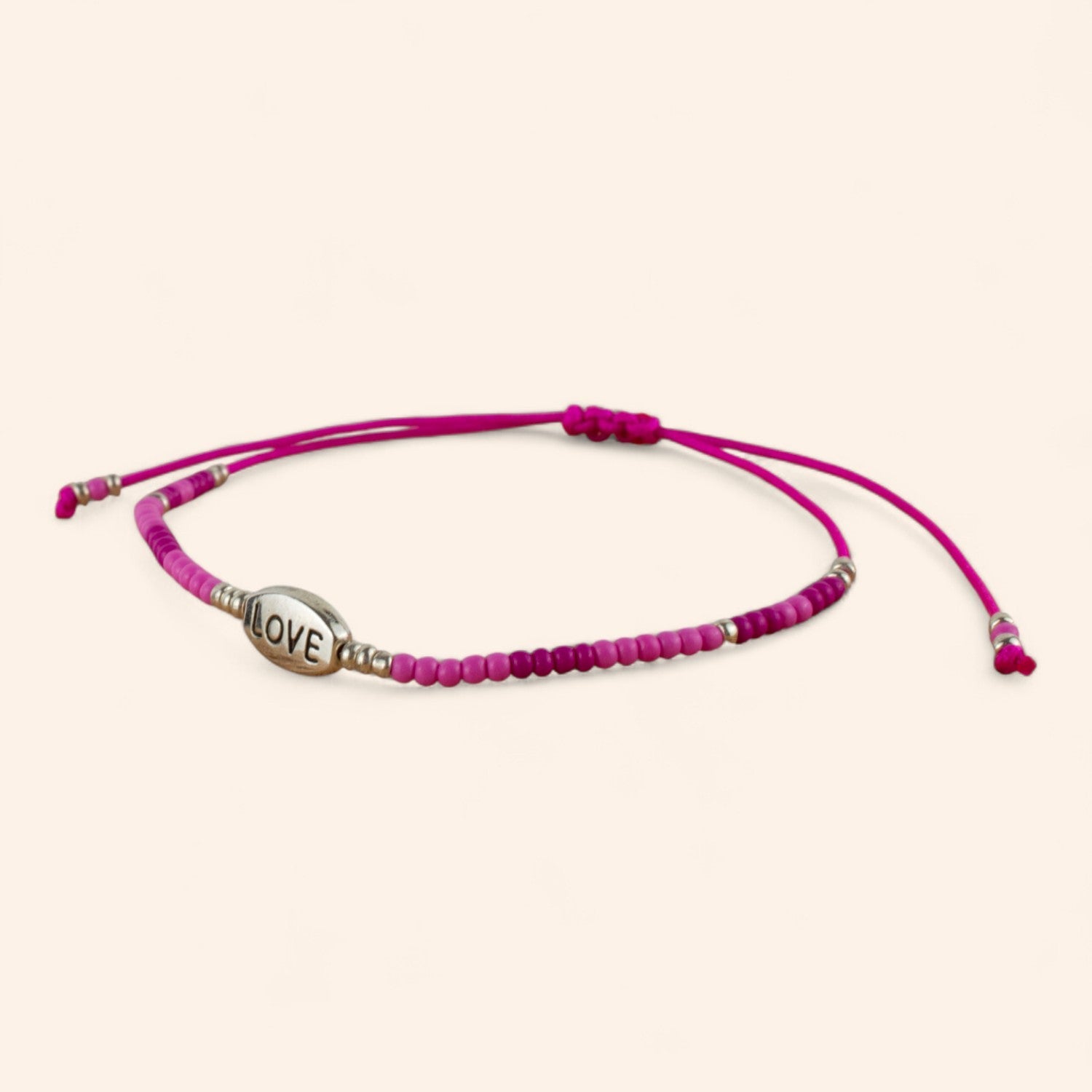 Bracelet perles rocailles fuchsia et perle Love en métal argenté  Bracelet Jethyka