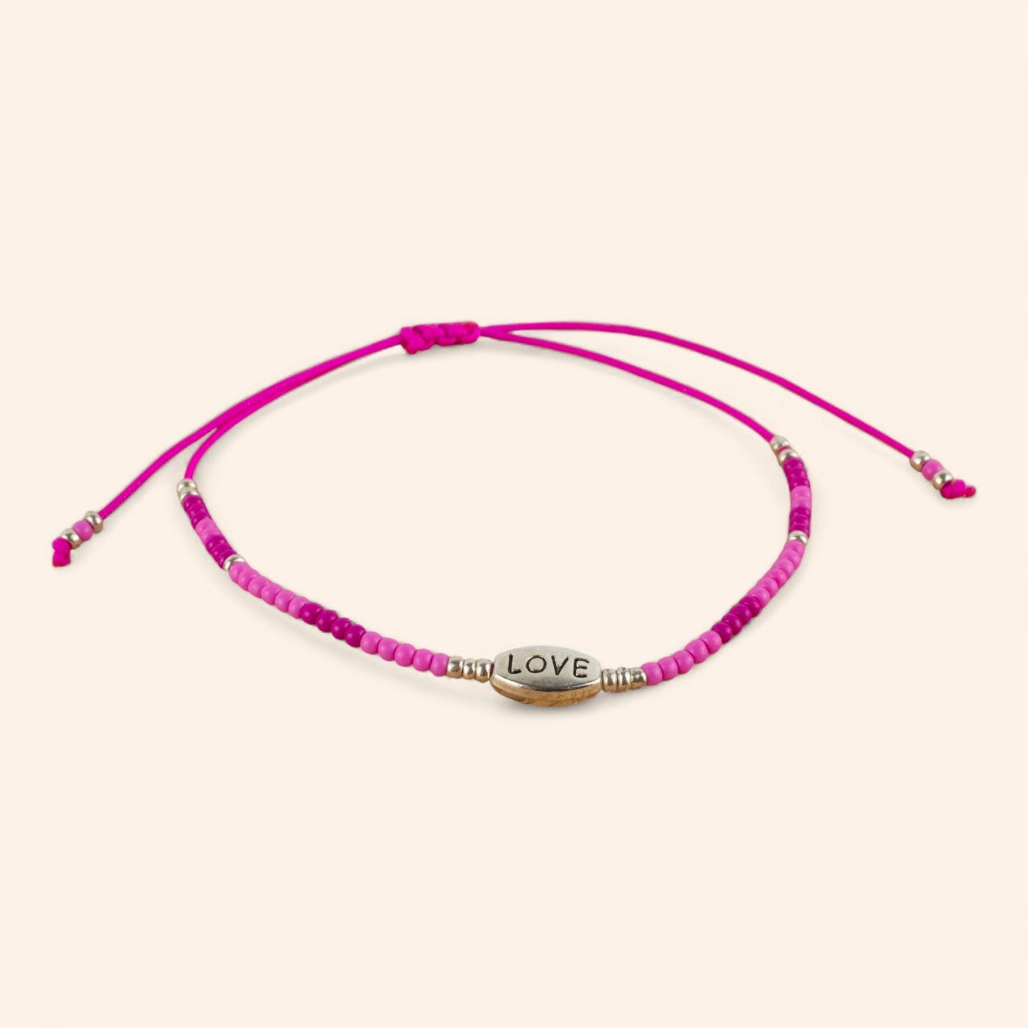 Bracelet perles rocailles fuchsia et perle Love en métal argenté  Bracelet Jethyka
