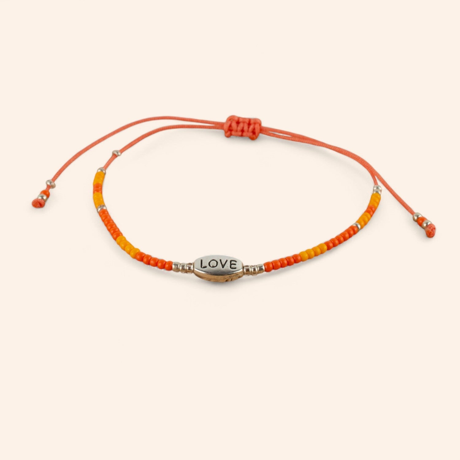 Bracelet Love perles rocailles orange  Bracelet Jethyka