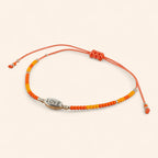Bracelet Love perles rocailles orange  Bracelet Jethyka