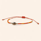 Bracelet Love perles rocailles orange  Bracelet Jethyka