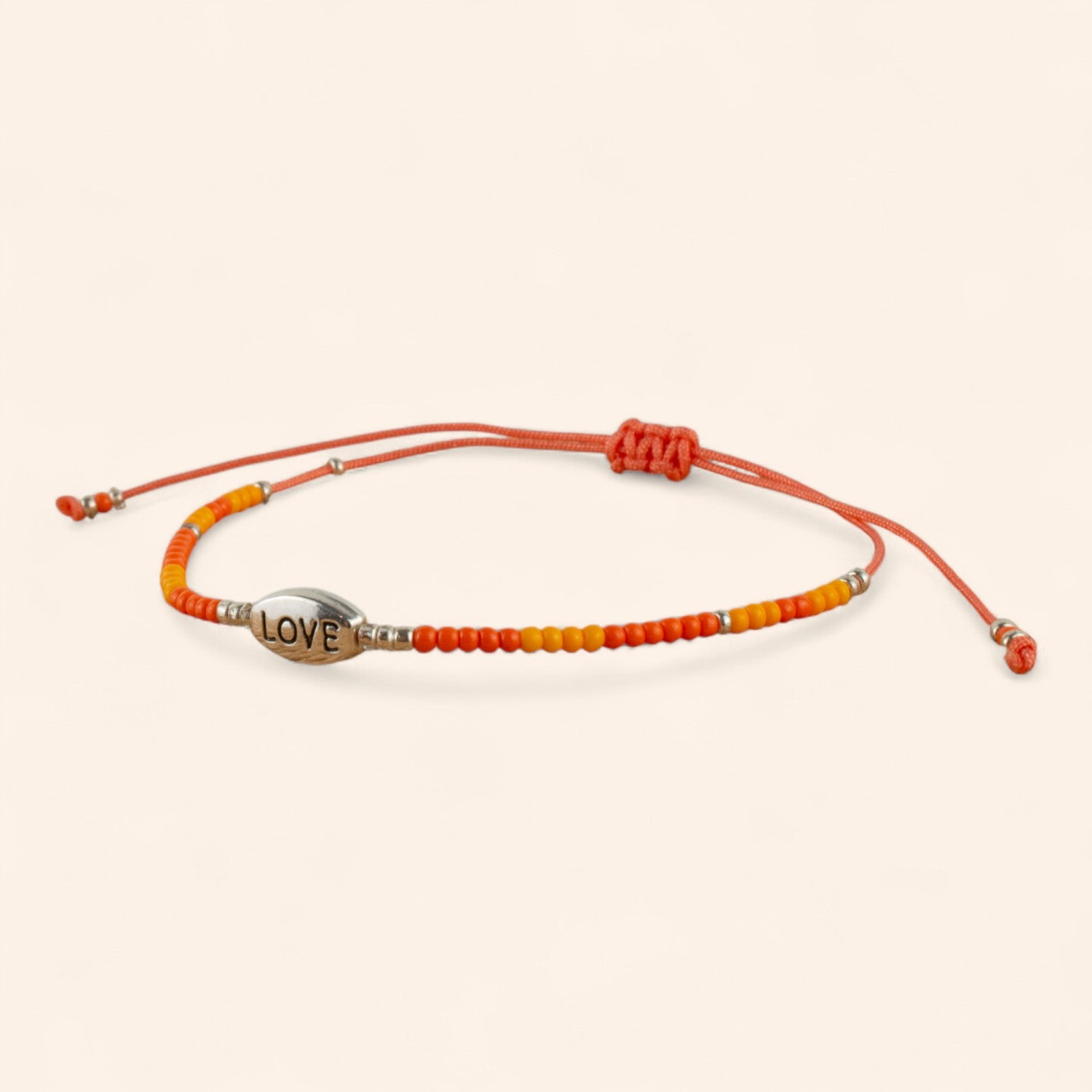 Bracelet Love perles rocailles orange  Bracelet Jethyka