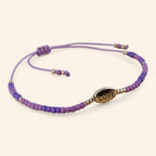 Bracelet perles rocailles violettes et perle Love en métal argenté  Bracelet Jethyka