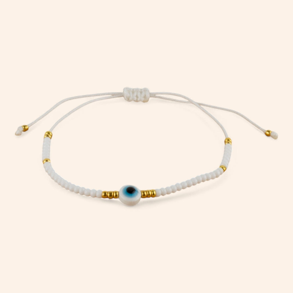 Bracelet Perles Rocailles Blanches et Dorées avec Œil Protecteur  Bracelet Jethyka