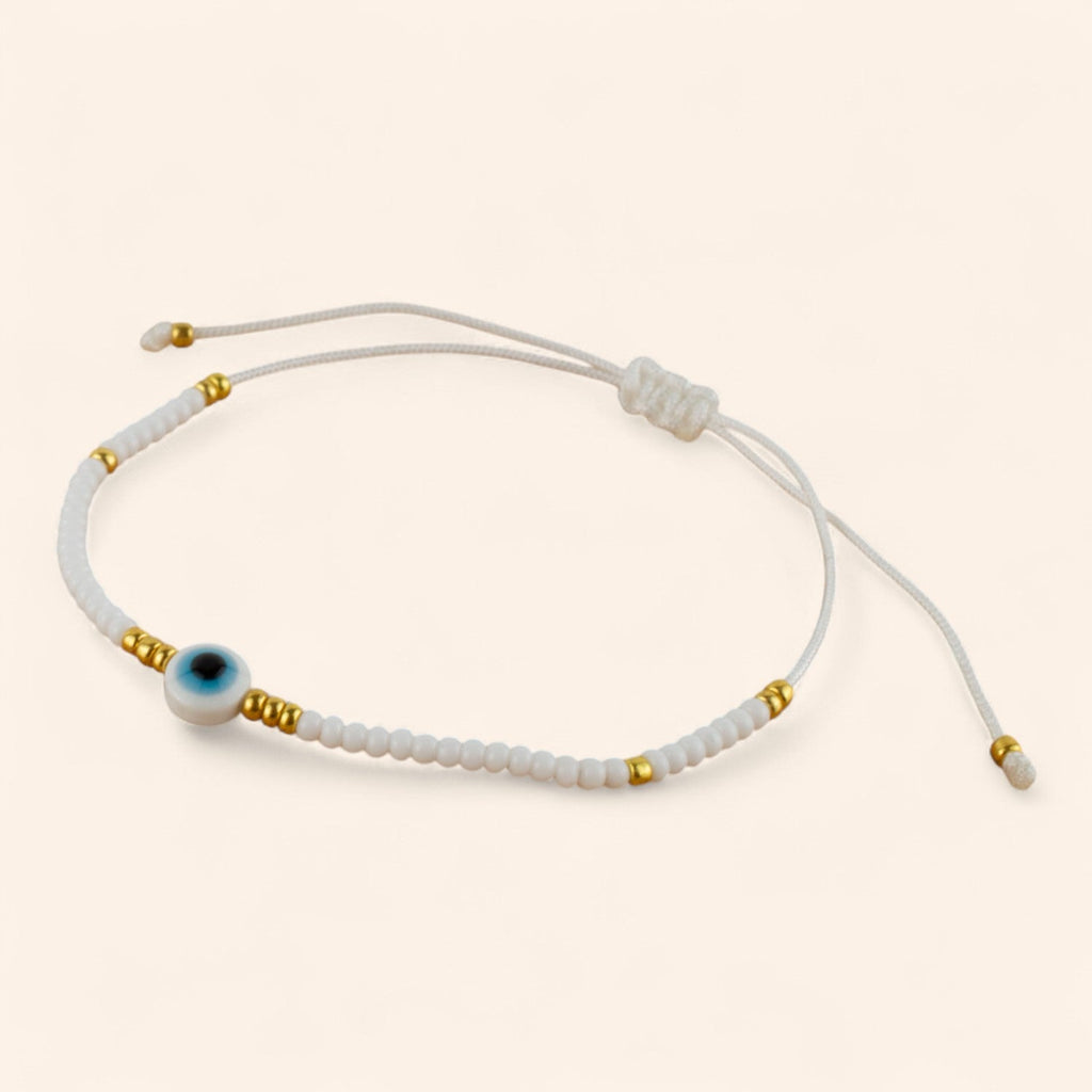 Bracelet Perles Rocailles Blanches et Dorées avec Œil Protecteur  Bracelet Jethyka