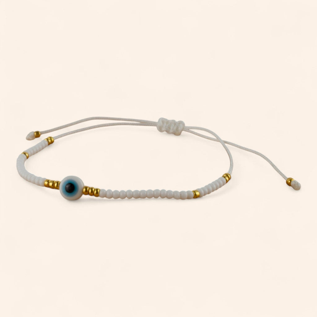 Bracelet Perles Rocailles Blanches et Dorées avec Œil Protecteur  Bracelet Jethyka