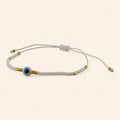 Bracelet Perles Rocailles Blanches et Dorées avec Œil Protecteur  Bracelet Jethyka