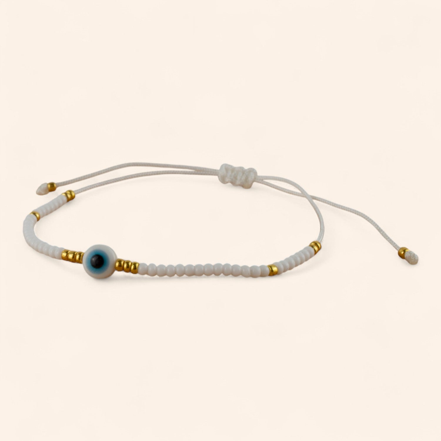 Bracelet Perles Rocailles Blanches et Dorées avec Œil Protecteur  Bracelet Jethyka
