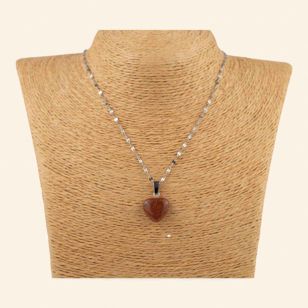 Pendentif cœur en pierre de sable et chaîne argentée