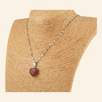 Pendentif cœur en pierre de sable et chaîne argentée