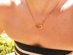 Collier cœurs dorés entrelacés  Collier Jethyka