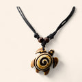 Collier homme tortue marron avec spirale  Collier Jethyka