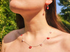 Boucles d'oreilles fleur perles de cristal Rouges