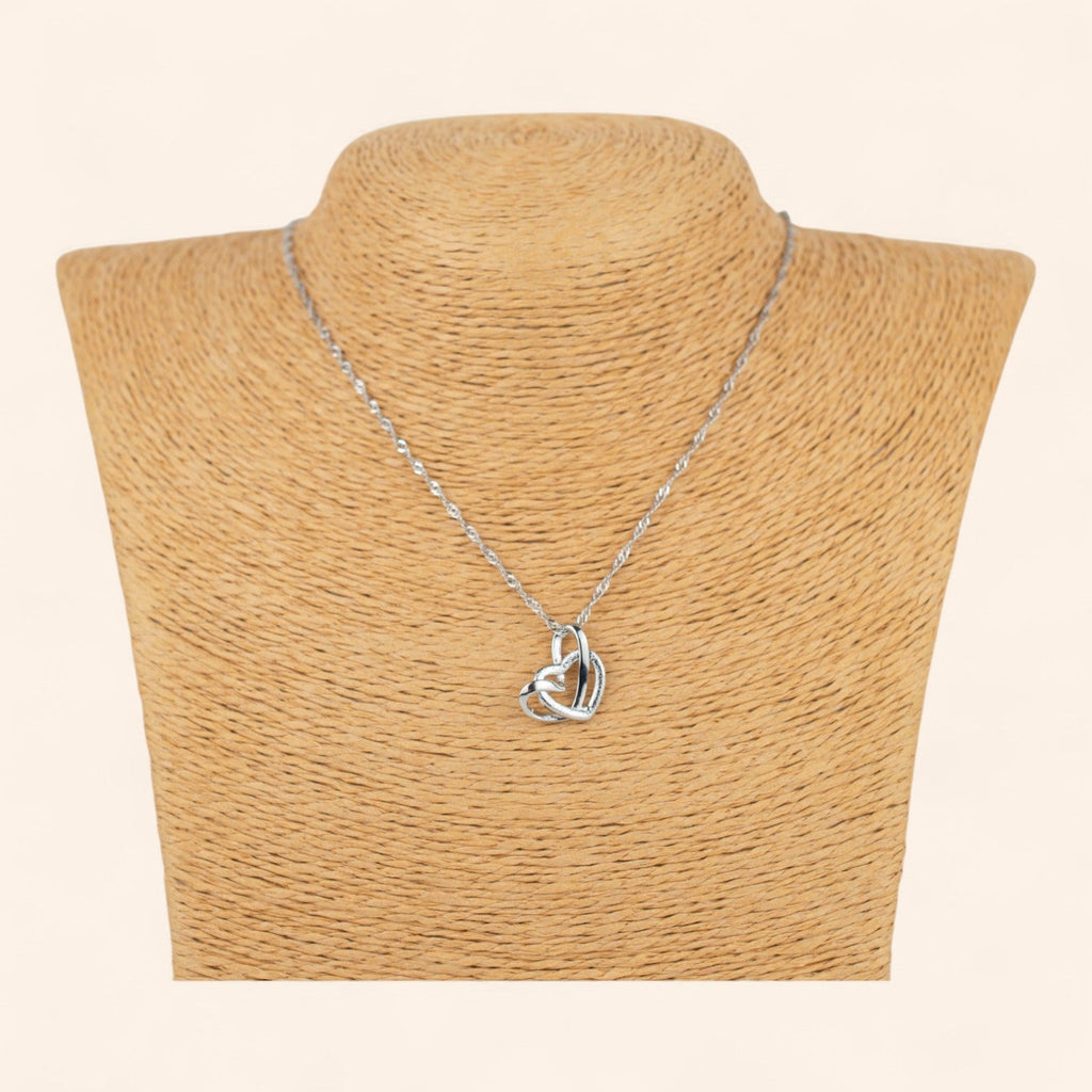 Collier femme en métal argenté avec pendentif 2 cœurs entrelacés  Collier Jethyka