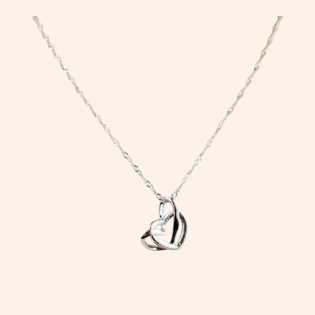 Collier femme en métal argenté avec pendentif 2 cœurs entrelacés  Collier Jethyka