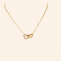 Collier cœurs dorés entrelacés  Collier Jethyka