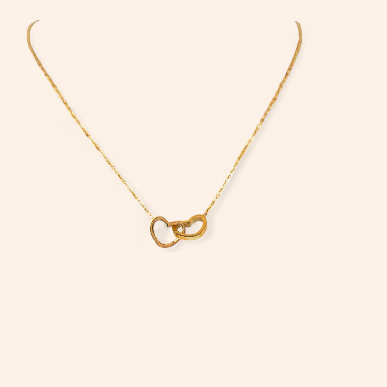 Collier cœurs dorés entrelacés  Collier Jethyka