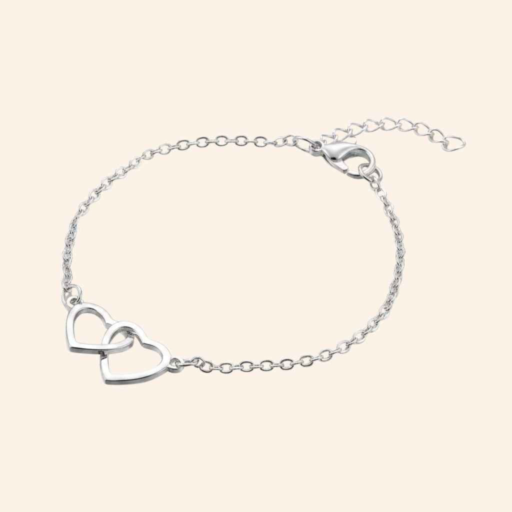 Bracelet Cœurs entrelacés et chaîne argentée