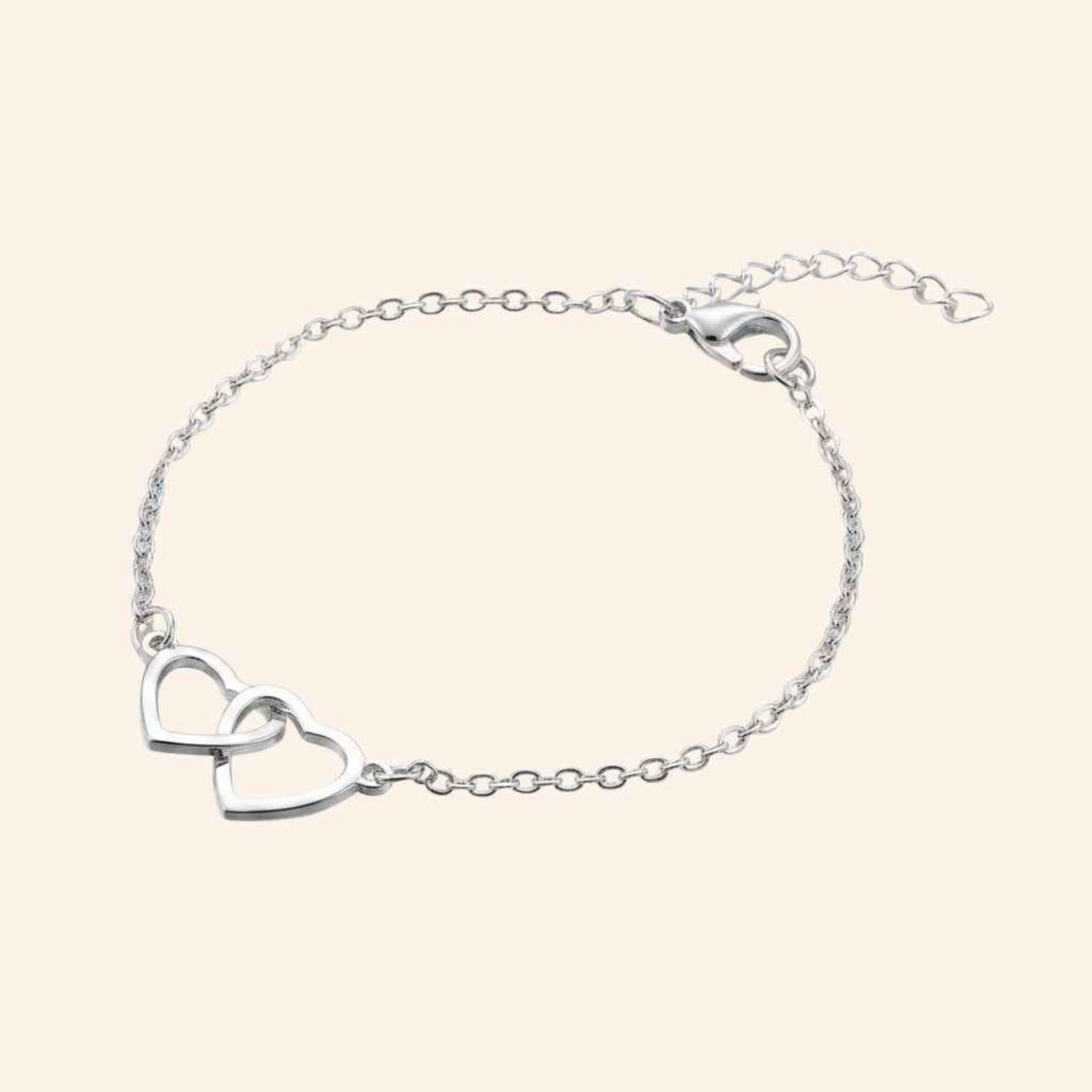 Bracelet Cœurs entrelacés et chaîne argentée