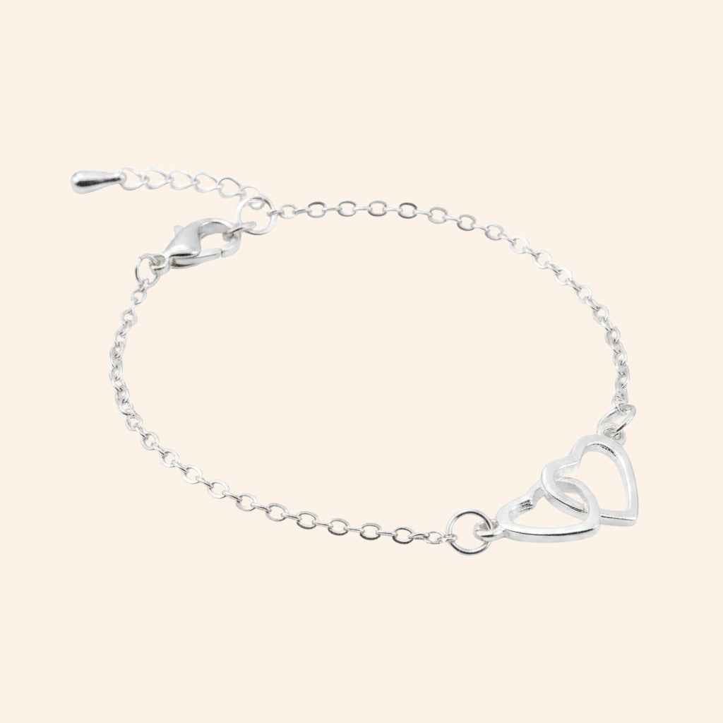 Bracelet Cœurs entrelacés et chaîne argentée