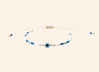 Bracelet JETHYKA œil protecteur en perles de rocaille bleues et blanches, cordon réglable