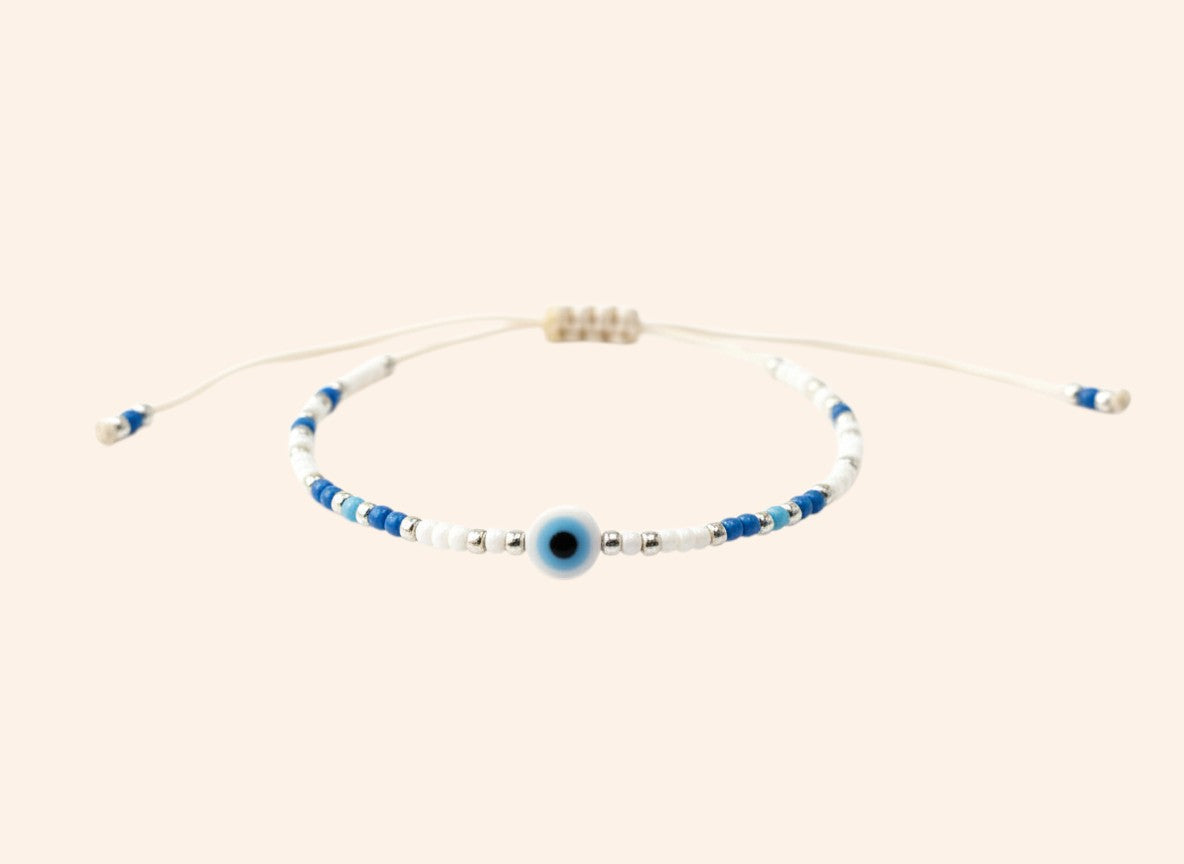 Bracelet JETHYKA œil protecteur en perles de rocaille bleues et blanches, cordon réglable