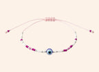 Bracelet JETHYKA œil protecteur en perles rocailles roses et blanches, cordon ajustable