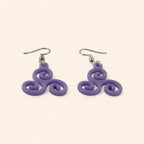 Boucles d'oreilles Triskell violettes en résine  Boucles d'Oreilles Jethyka